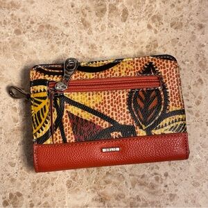 Relic tropical clutch wallet
